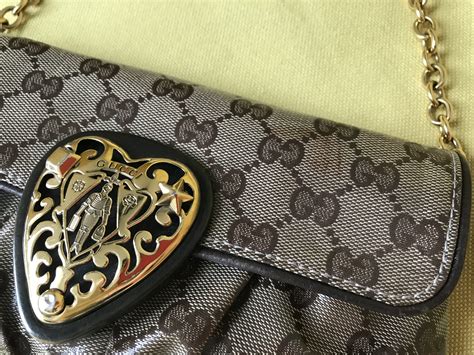 gucci heart clutch|clutch gucci originally.